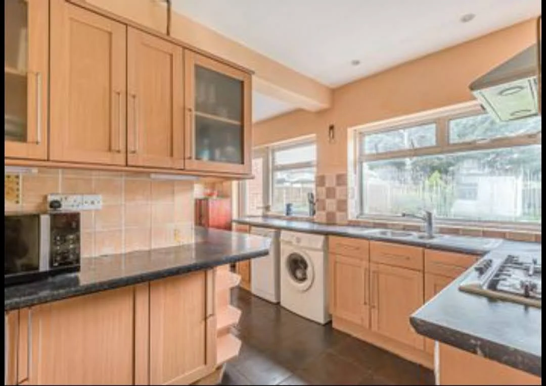 Ensure images of the kitchens in the blog have alt text like: "Modern Nolte German Kitchens in Gerrards Cross by Roman Haus"